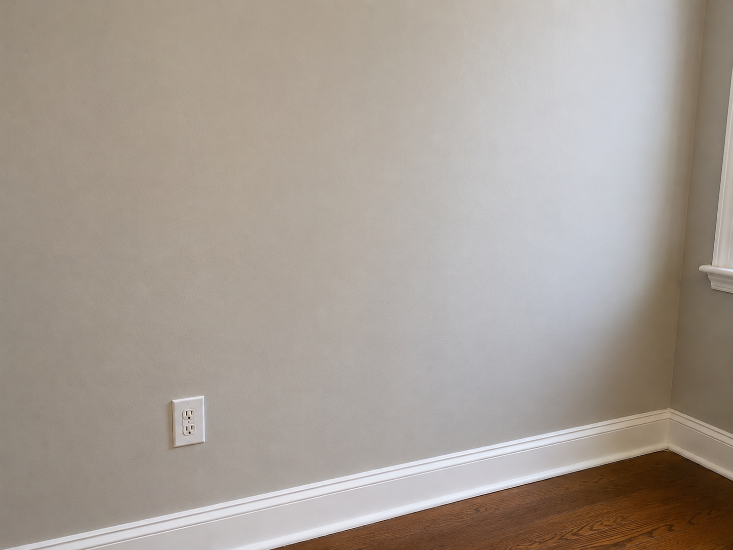 Drywall wall after patch and paint repair with smooth finished surface in Medford